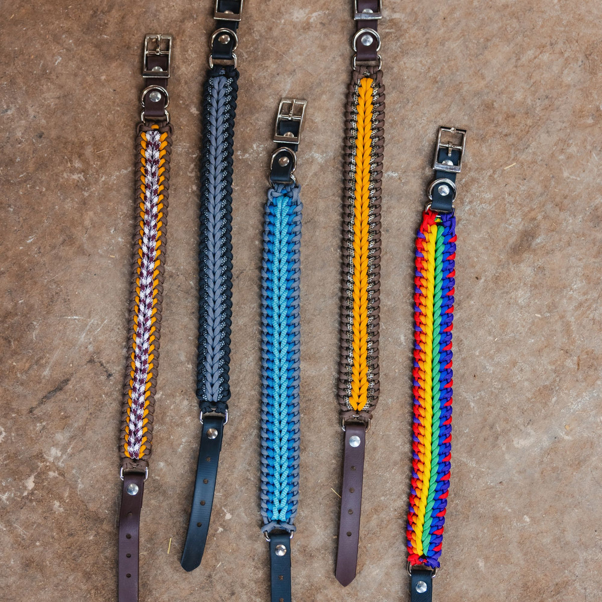 Five handmade paracord dog collars in different colors
