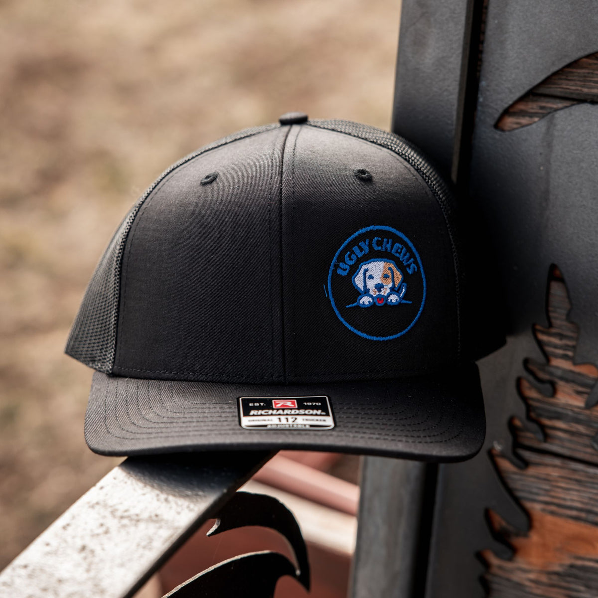 Black Ugly Chews trucker cap with logo patch